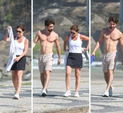 Adriana Esteves passeia com filho na orla e Felipe Ricca rouba a cena sem camisa