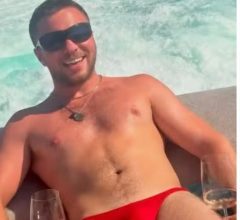 Filho de Madonna viraliza em sunga vermelha durante férias na Europa